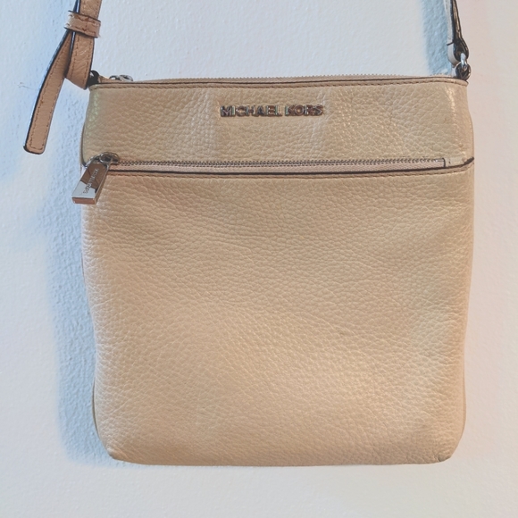 Michael Kors Handbags - Michael kors flat rectangular cross body purse, light tan/beige color